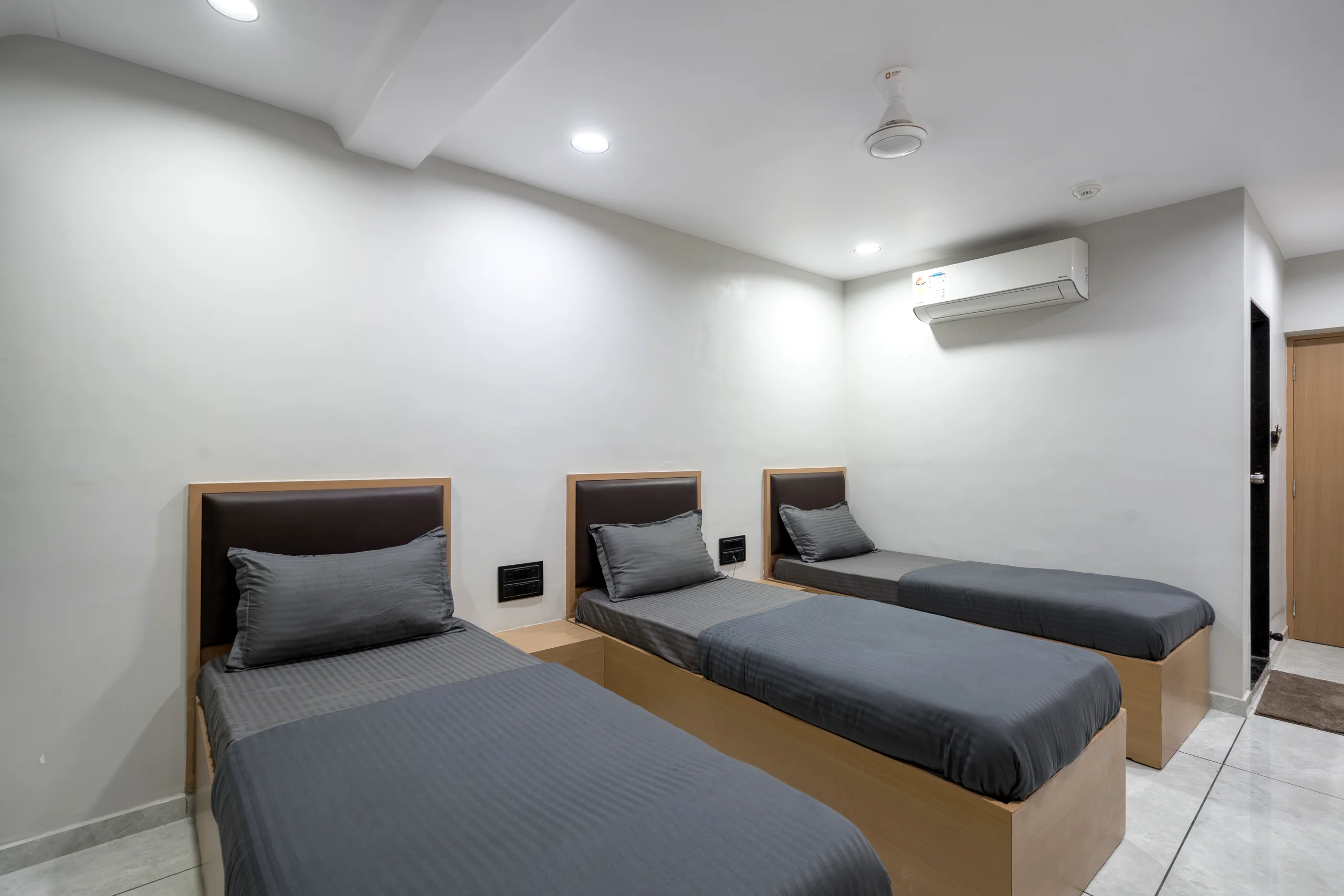 Luxora Boys PG 1 3-sharing air-conditioned spacious bedroom