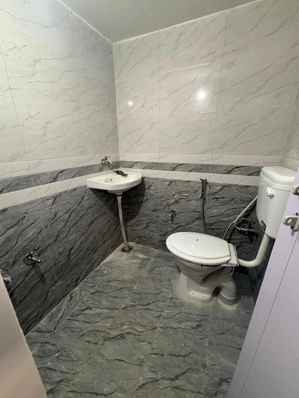 Sorath Boys PG 3 hygienic bathroom with geyser heater